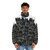 Suspicious Cats Puffer Jacket featuring a whimsical black and white cat pattern design - men front