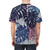 Closeup of tropical monstera leaves in a surreal, colorful design on a t-shirt - men back
