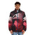A person wearing a warm, cozy puffer jacket with a bearded vulture-inspired design - men front