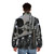 Puffer jacket featuring a biomechanical sculpture design inspired by H R Giger's surreal art - men back