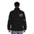 Sebastian Vettel wearing Aston Martin F1 team puffer jacket with 5 V design - men back