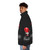 Stylish puffer jacket featuring a digital drawing of football legend George Best - men side left