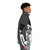 Skeleton chef wearing a grey puffer jacket, standing in a kitchen - men side right