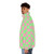 A colorful, oversized puffer jacket featuring a checkered y2k pattern in pink and green - men side left