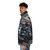 George Russell wearing a puffer jacket with his 2023 Formula 1 racecar design - men side left