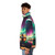Model wearing a puffer jacket with a stunning northern lights design - men side left