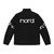 A person wearing a puffer jacket with the Nord piano keyboard logo - Back