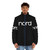 A person wearing a puffer jacket with the Nord piano keyboard logo - men front
