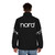 A person wearing a puffer jacket with the Nord piano keyboard logo - men back