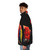 Scarlet macaw bird wearing a puffer jacket against a black background - men side left