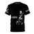 Model wearing a vibrant, music-themed all-over print t-shirt with electronic beats and synth sound elements.