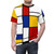 Model wearing a t-shirt featuring a De Stijl-inspired geometric abstract art design in primary colors. - men front
