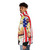 Conan O'Brien wearing an American flag puffer jacket with the Team Coco logo - men side left