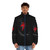A sleek, black puffer jacket featuring a space-inspired design with stars, planets, and a cosmonaut helmet. - men front
