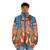 Stefon from Saturday Night Live wearing a bold puffer jacket in a pop art design - men front