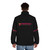 A stylish red puffer jacket featuring the Royal Concertgebouw Orchestra logo - men back