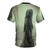 Model wearing a t-shirt with a La Llorona Halloween design, featuring a ghostly figure in a haunted forest setting. - Back