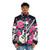 A pink puffer jacket with a floral rose print, perfect for the music lover - men front