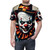 Terrifying clown face with eerie grin on t-shirt - men front
