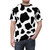 Cow spots pattern printed on a high-quality t-shirt for nature and farm enthusiasts - men front