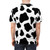 Cow spots pattern printed on a high-quality t-shirt for nature and farm enthusiasts - men back