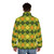 Colorful argyle patterned puffer jacket in shades of green, yellow, and orange - men back