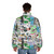 A collage-style puffer jacket featuring aviation-themed imagery and safety elements. - men back