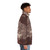 A cozy puffer jacket featuring a bear design, perfect for outdoor winter exploration. - men side right