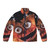 Gritty, the Philadelphia Flyers' quirky and beloved mascot, adorns a bright orange puffer jacket.