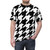 Model wearing a classic black and white houndstooth pattern t-shirt with a large, bold graphic print - men front