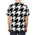 Model wearing a classic black and white houndstooth pattern t-shirt with a large, bold graphic print - men back