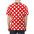 Model wearing a red and white polka dot printed AOP t-shirt - men back