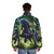 A black unicorn puffer jacket featuring a fantasy animal design - men back