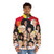 Colorful puffer jacket with pride flag design and Alejandro Mogollo's art - men front