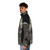 A warm and stylish puffer jacket featuring a wolf and skull design, perfect for the cold winter months. - men side left