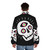 Vibrant puffer jacket featuring an enlightened skull design - men back