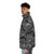 A stylish puffer jacket featuring a reef-inspired design, perfect for outdoor adventures. - men side left