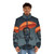 Emotional robot wearing orange and gray puffer jacket standing under umbrella - men front