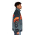 Emotional robot wearing orange and gray puffer jacket standing under umbrella - men side right
