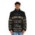 Economics teacher wearing a puffer jacket with a typographic design - men front