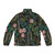 Tropical Dream Puffer Jacket featuring lush monstera leaves and palm trees