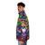 A puffer jacket featuring a vibrant Alice in Wonderland design, perfect for literary fashion enthusiasts. - men side left