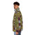 Puffer jacket with colorful geometric patterns inspired by the artwork of Alfred Jensen - men side left