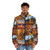 Colorful puffer jacket featuring autumnal landscape inspired by Canadian painter Tom Thomson - men front
