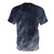 A t-shirt featuring a surreal, moody blue sky with clouds and a crescent moon. - Back
