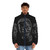 Omar Sy wearing a stylish puffer jacket with a scribble-inspired design - men front
