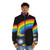 A vibrant puffer jacket with a rainbow design, representing the Irish legend of the pot of gold. - men front