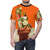 A bright, abstract floral graphic design on a white t-shirt against a vivid orange background. - men front