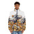 Person wearing cozy puffer jacket with gold kitten and dragon hoard design - men front