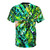 Model wearing a vibrant all-over print t-shirt featuring a tropical palm tree design. - Back